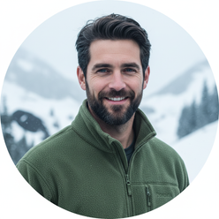 Portrait of Elias Thorne, a man with a rugged look, wearing a dark fleece jacket against a blurred snowy mountain background.
